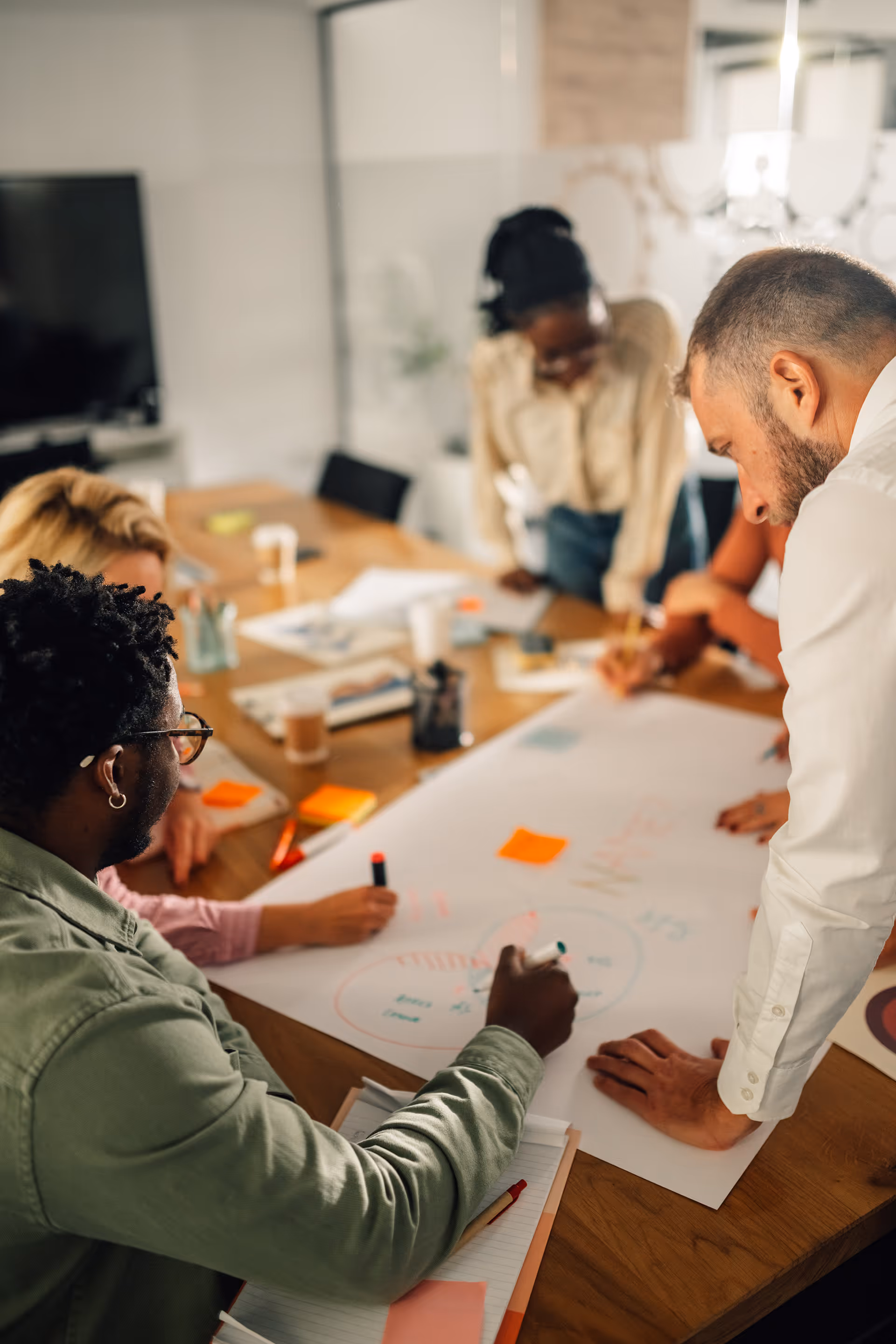A workplace brainstorming session at a burn out prevention program held by The Balanced Elite.