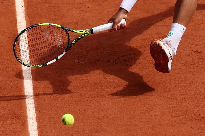 Joueur de tennis sur terre battue