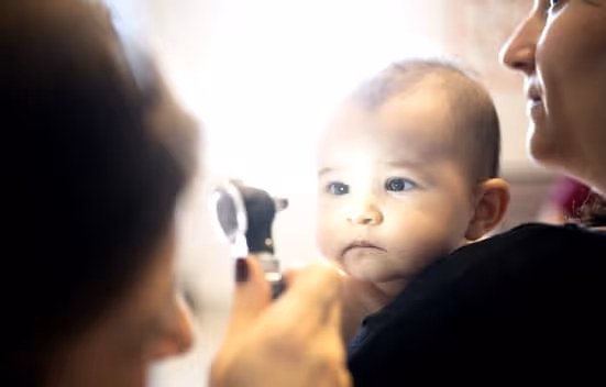 Baby Having An Eye Exam At Kidner Opticians