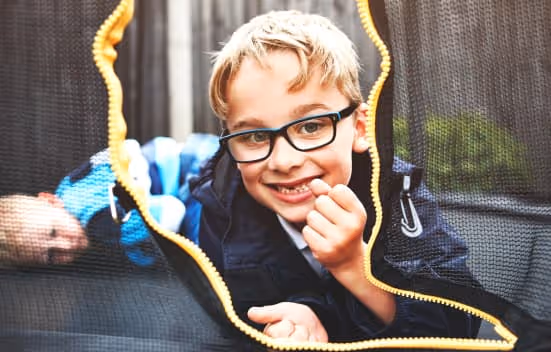Young Boy Wearing Glasses