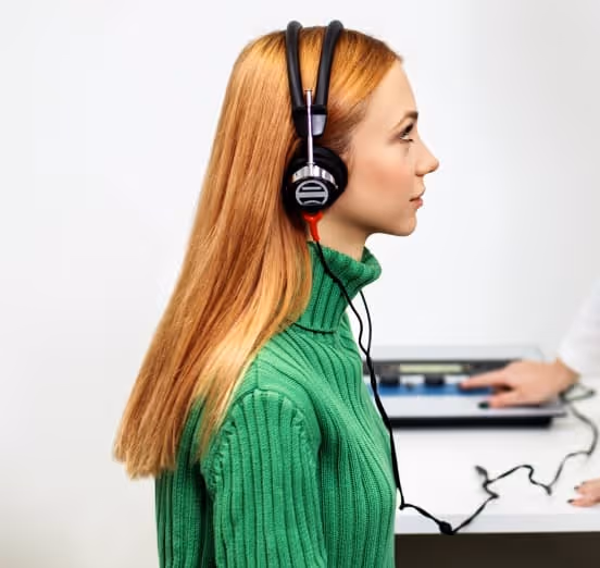 Women Listening To Music Wearing Headphones