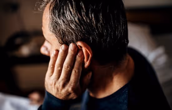 Man Suffering From Ear Ache 
