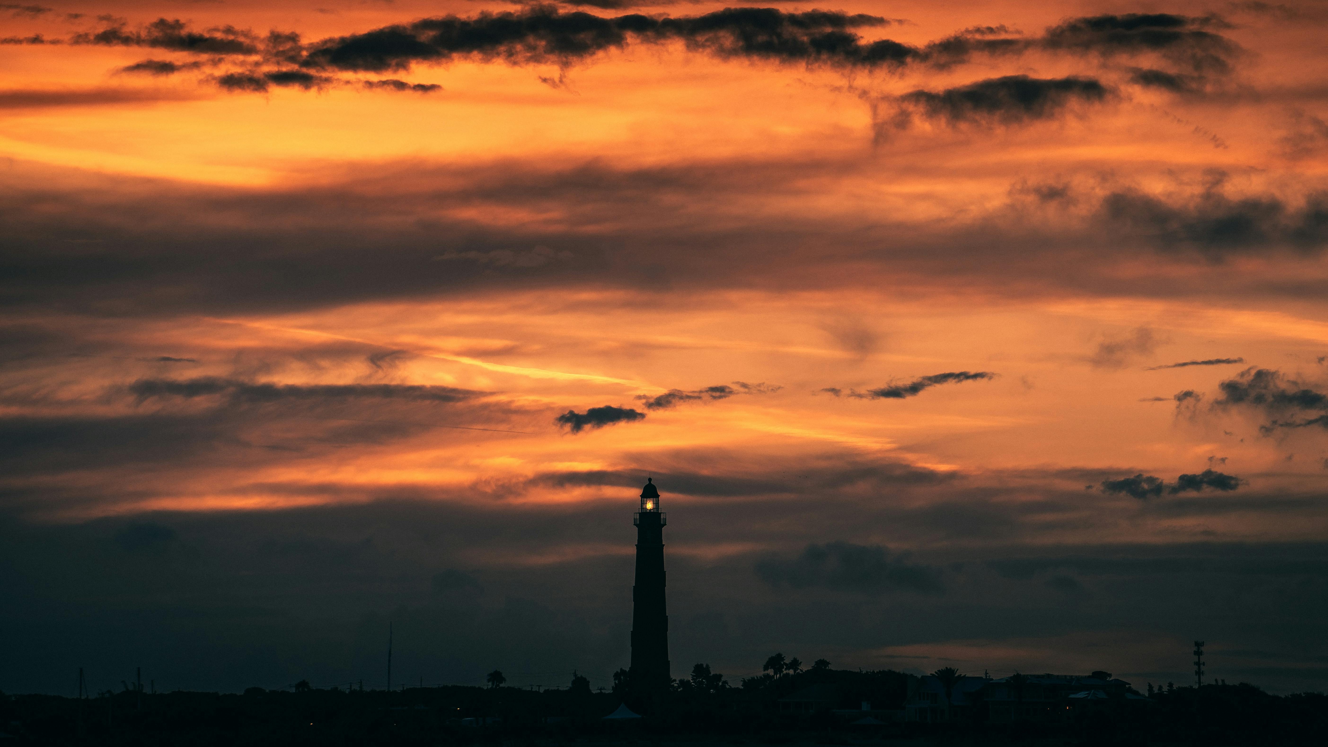 Lighthouse on orange sunset