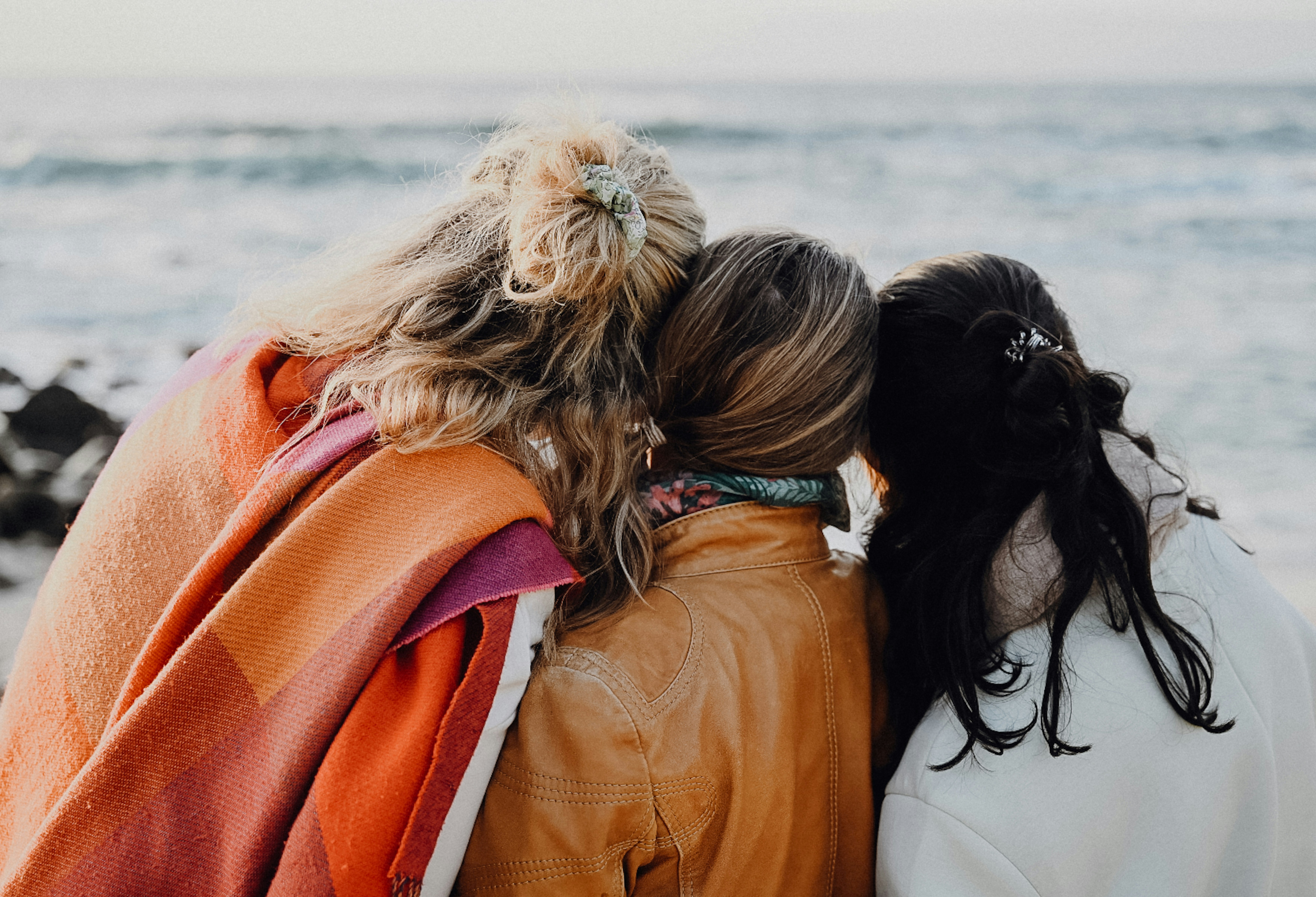 3 people hugging