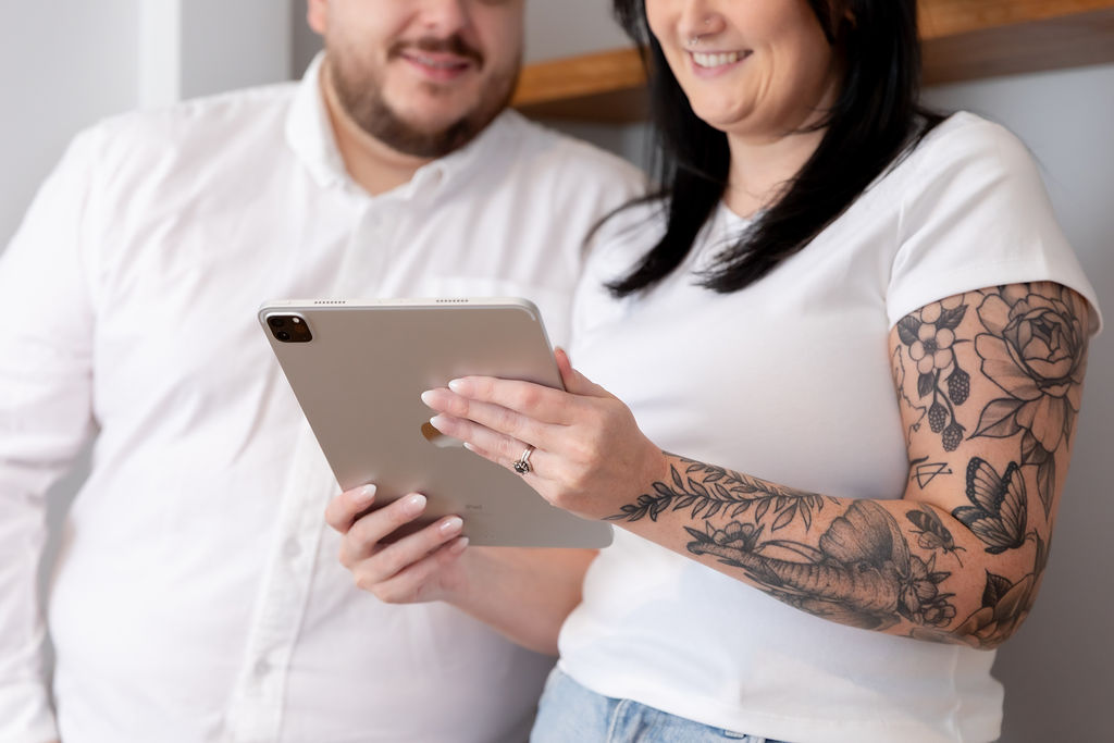 Alice Xerri, Founder and Fractional Content Lead, Freelance Copywriter for Finance, B2B Tech and SaaS, showing client work on iPad.