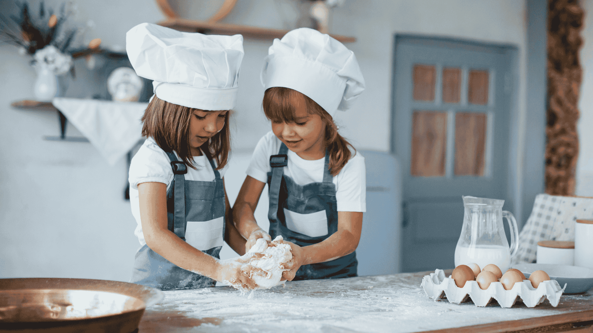 Two children cooking together in the kitchen, learning healthy habits through fun family activities – The Laughing Broccoli