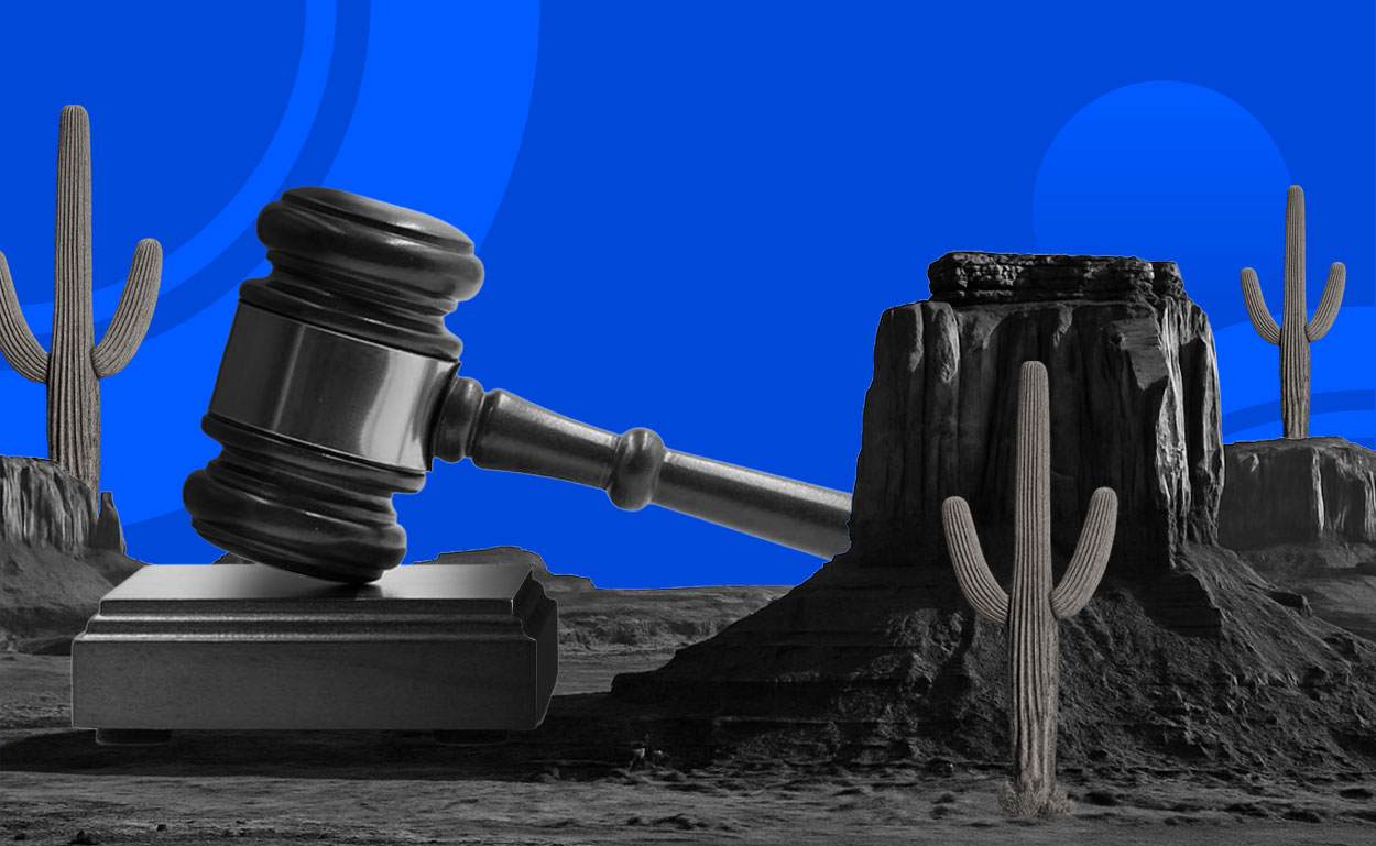 Southwest desert landscape with judges gavel.