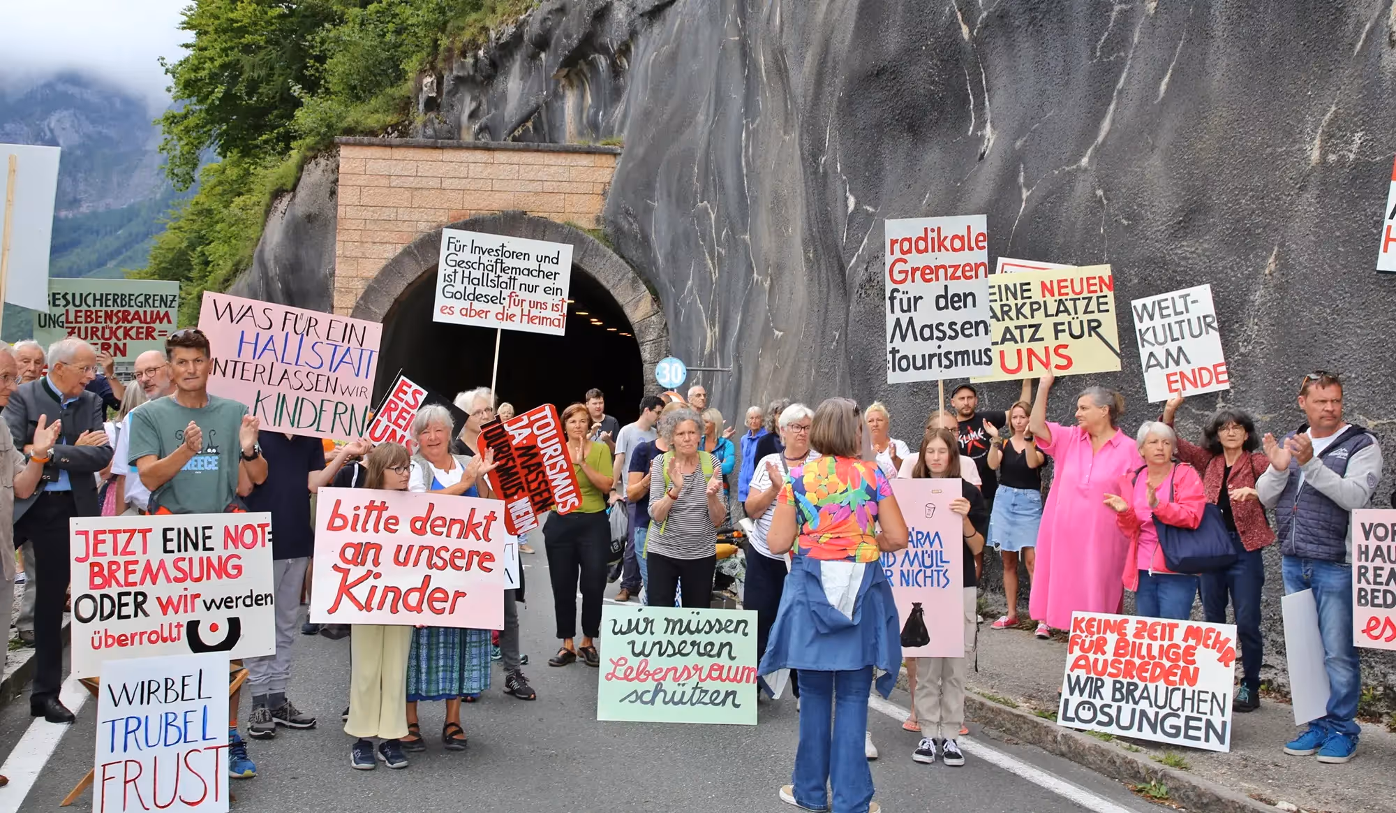 Locals protest against overtourism in Hallstatt, Austria, on August 27, 2023