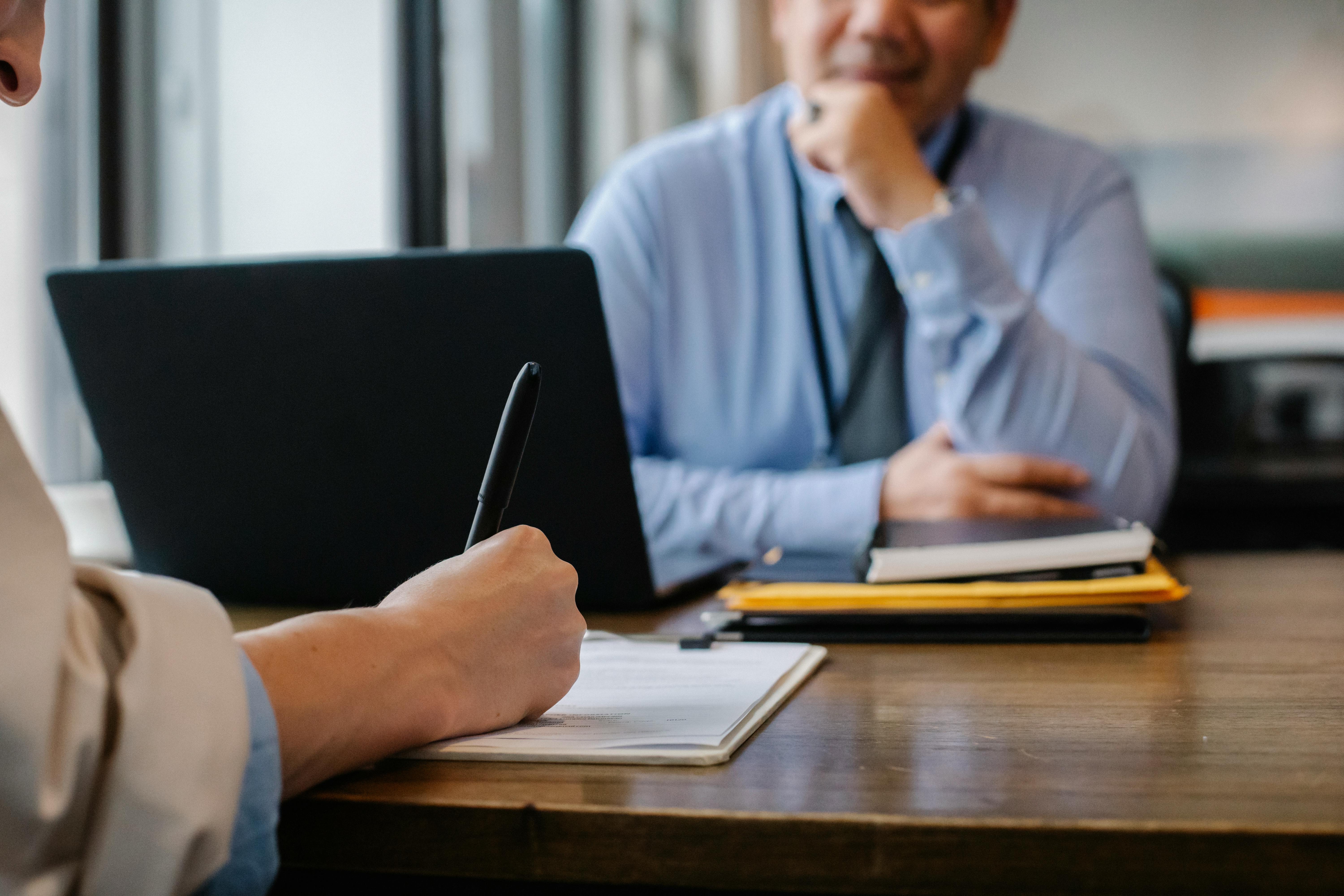 Attorney reviewing documents at a law firm office desk