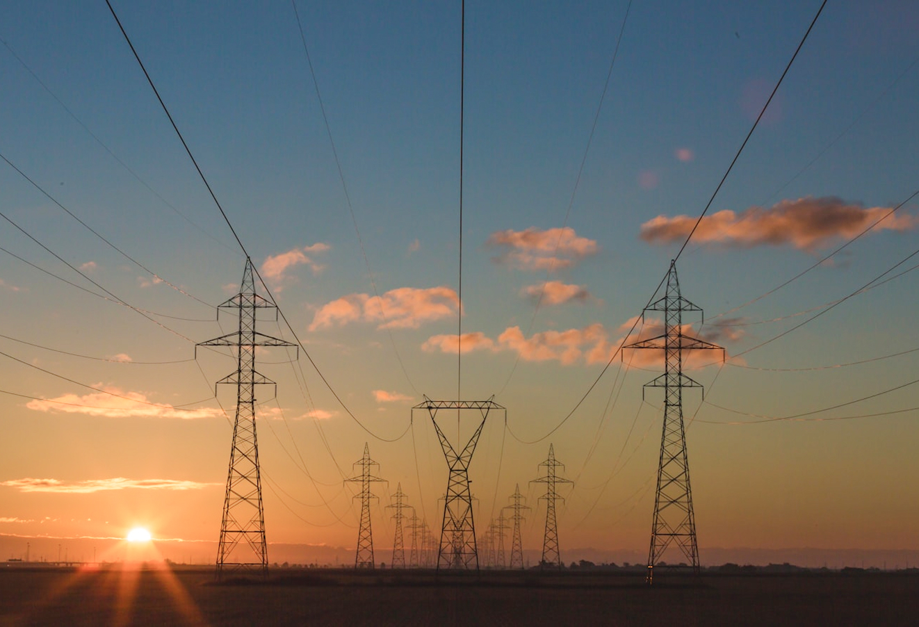Rows of power lines at sunset