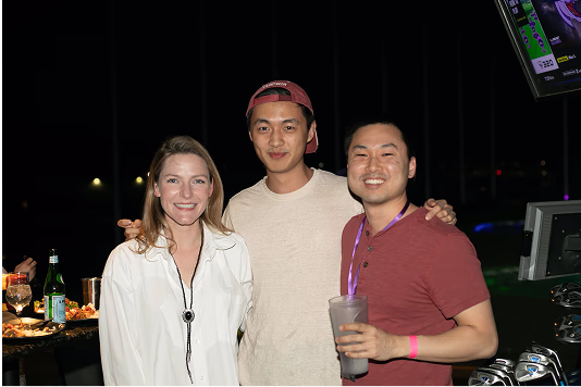 Three Flex employees at an offsite