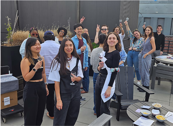 A group of Flex employees on a rooftop