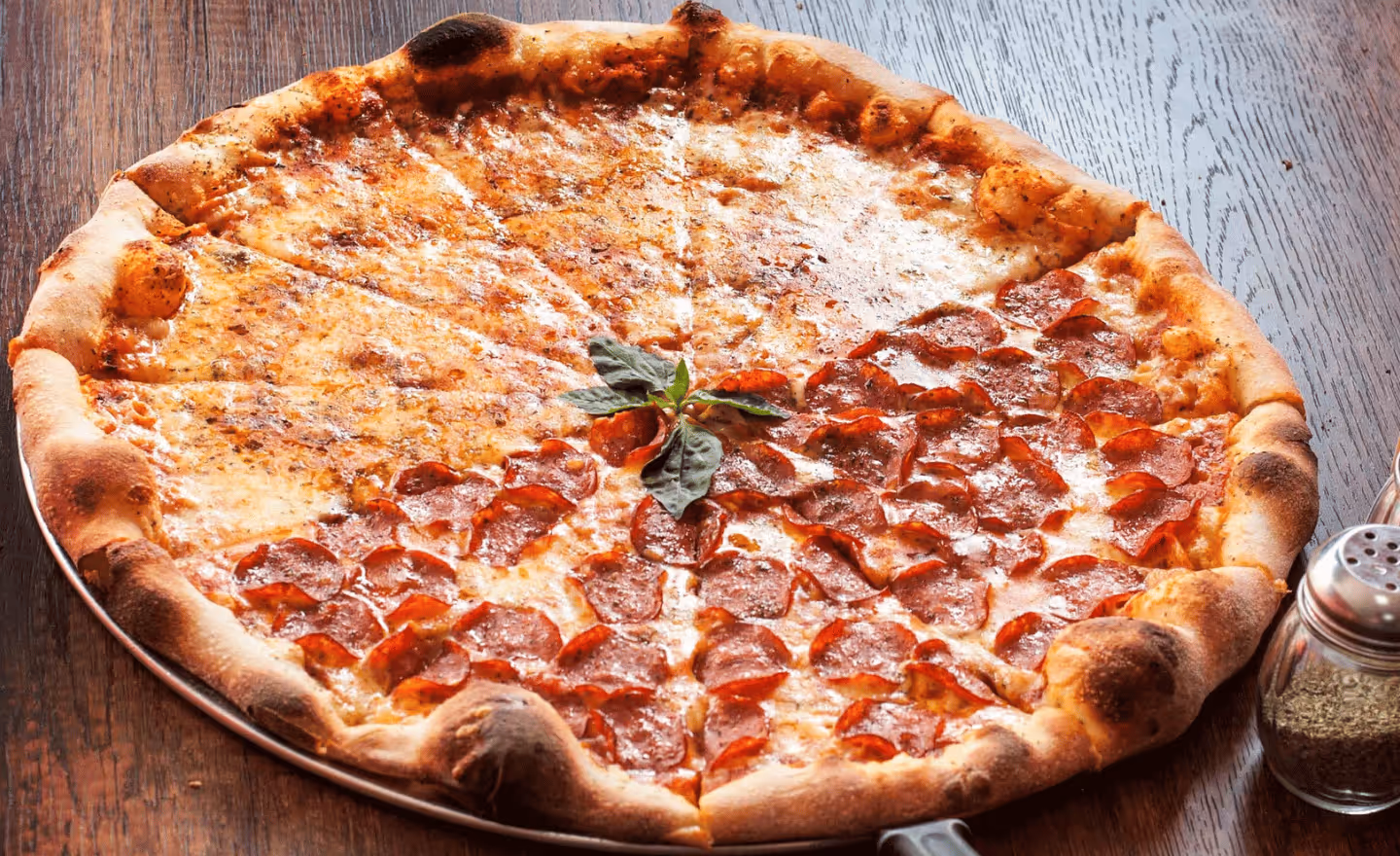 a generic pizza style with half cheese and pepperoni