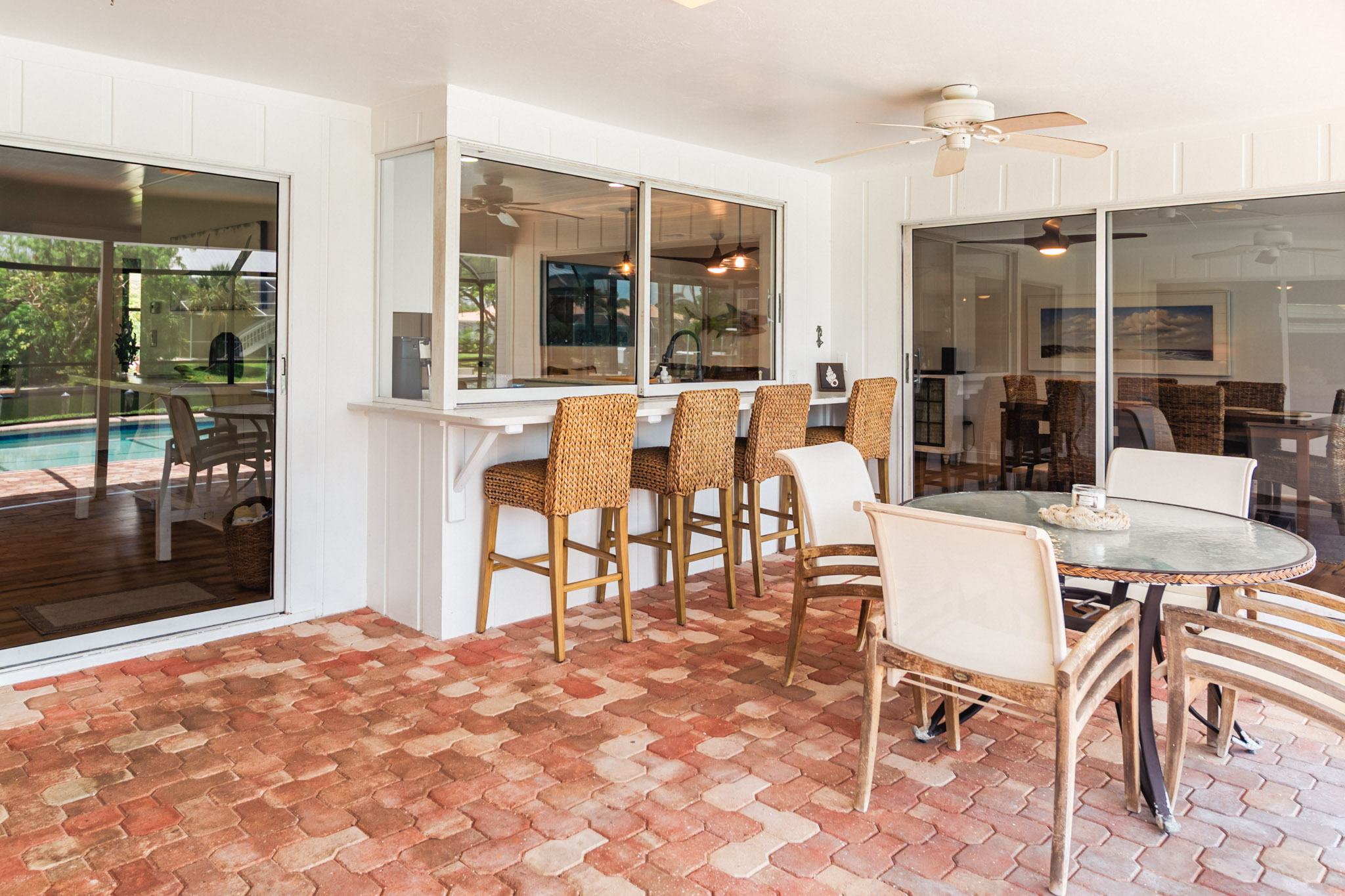 View of sliding glass doors from lanai into the dining room.