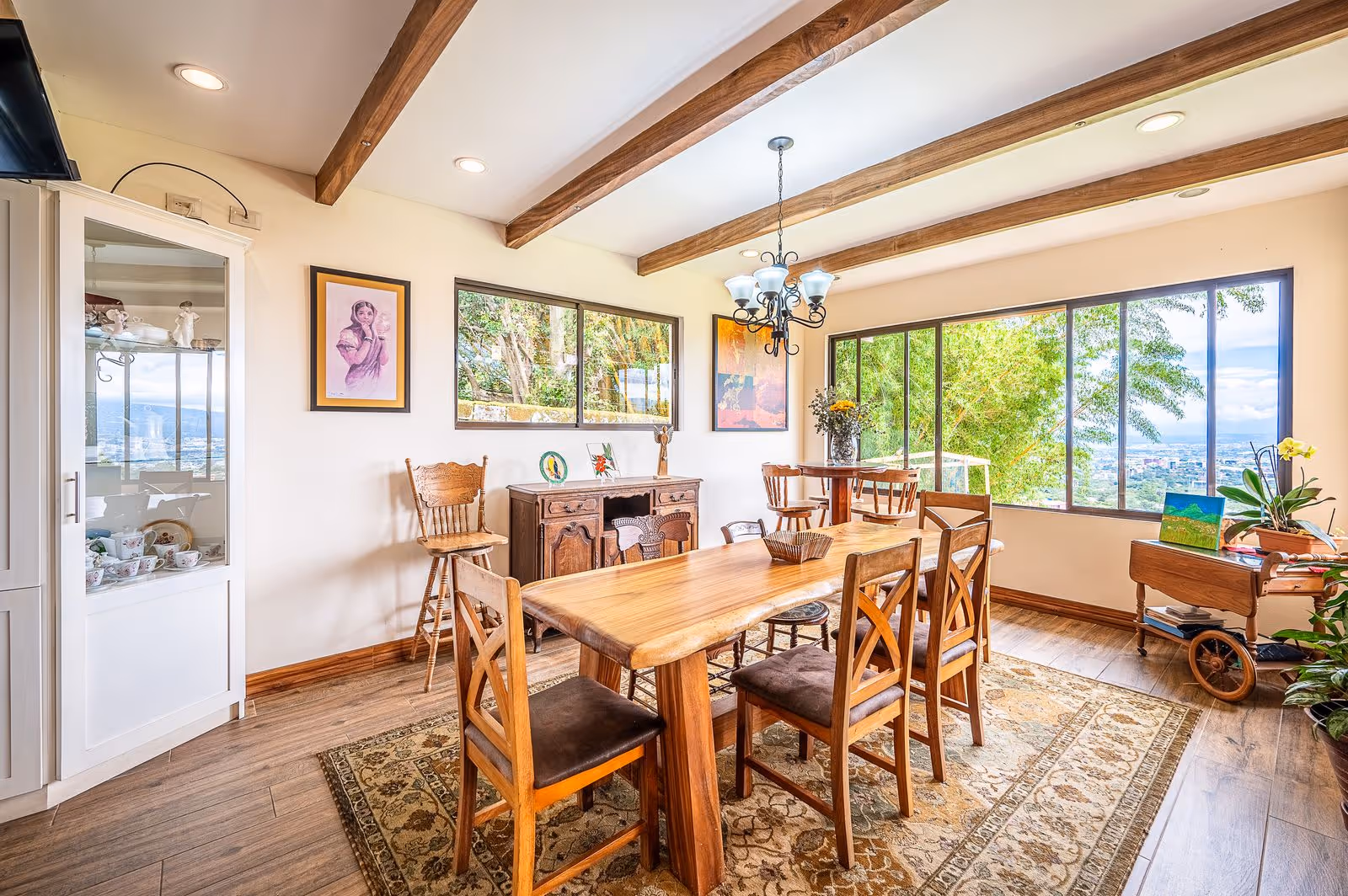 Indoor dining area with open layout connected to kitchen and living room.