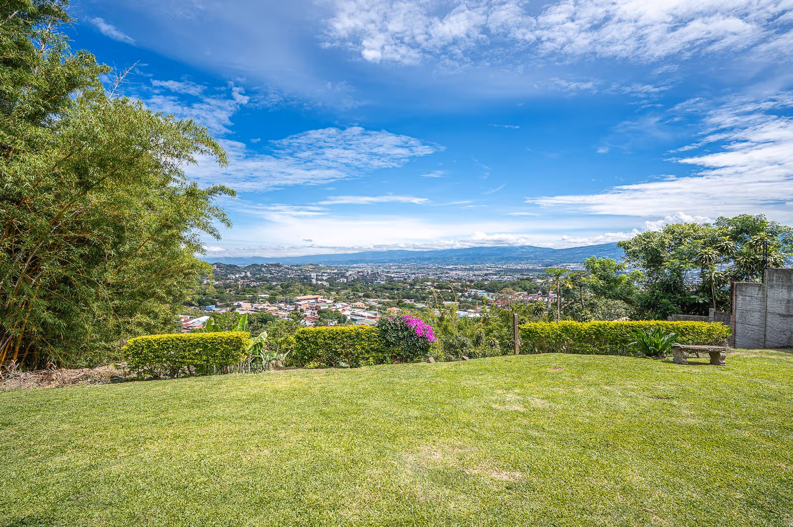 Beautiful private garden area behind the main house with city views in peaceful Escazu location.