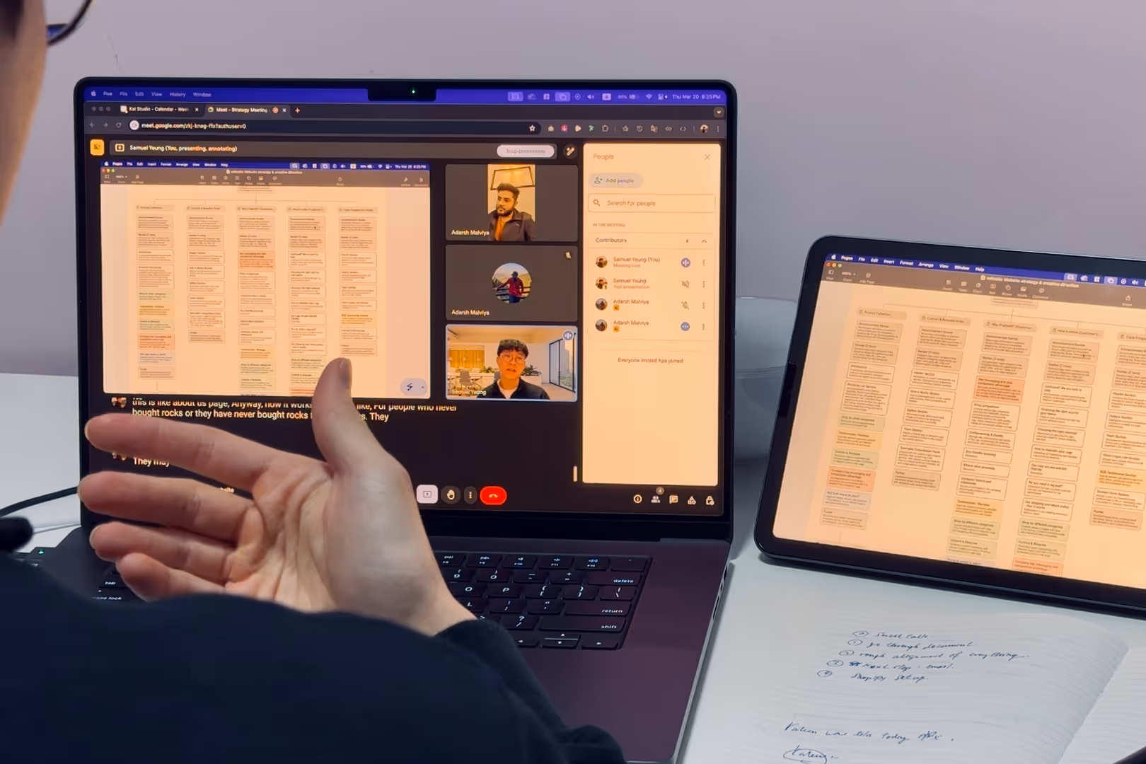 a third person view of Kai Studio discussing a website project with a client over video call.