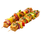 Two grilled chicken skewers with pineapple, red onion, and bell peppers, garnished with fresh herbs on a light background.