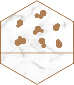 Numerous dots of varied sizes in a hexagon shape