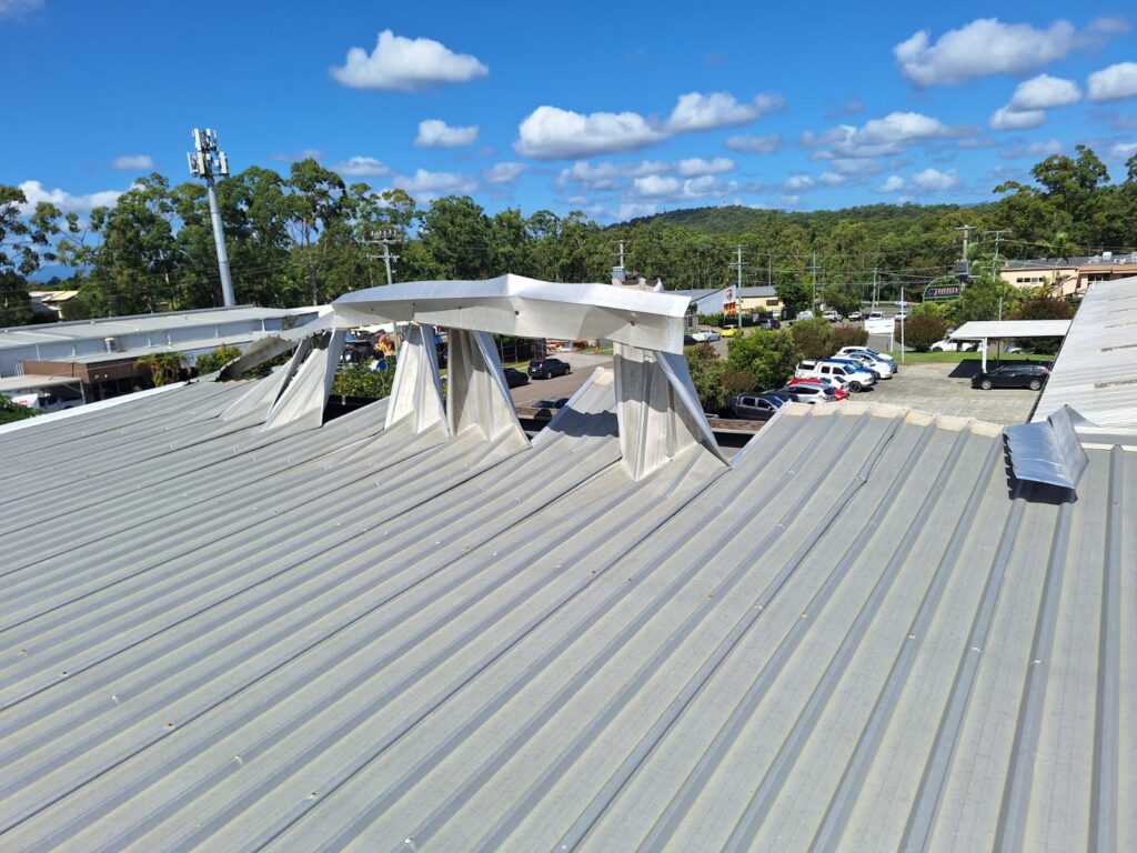 Metal roof damaged by storm weather