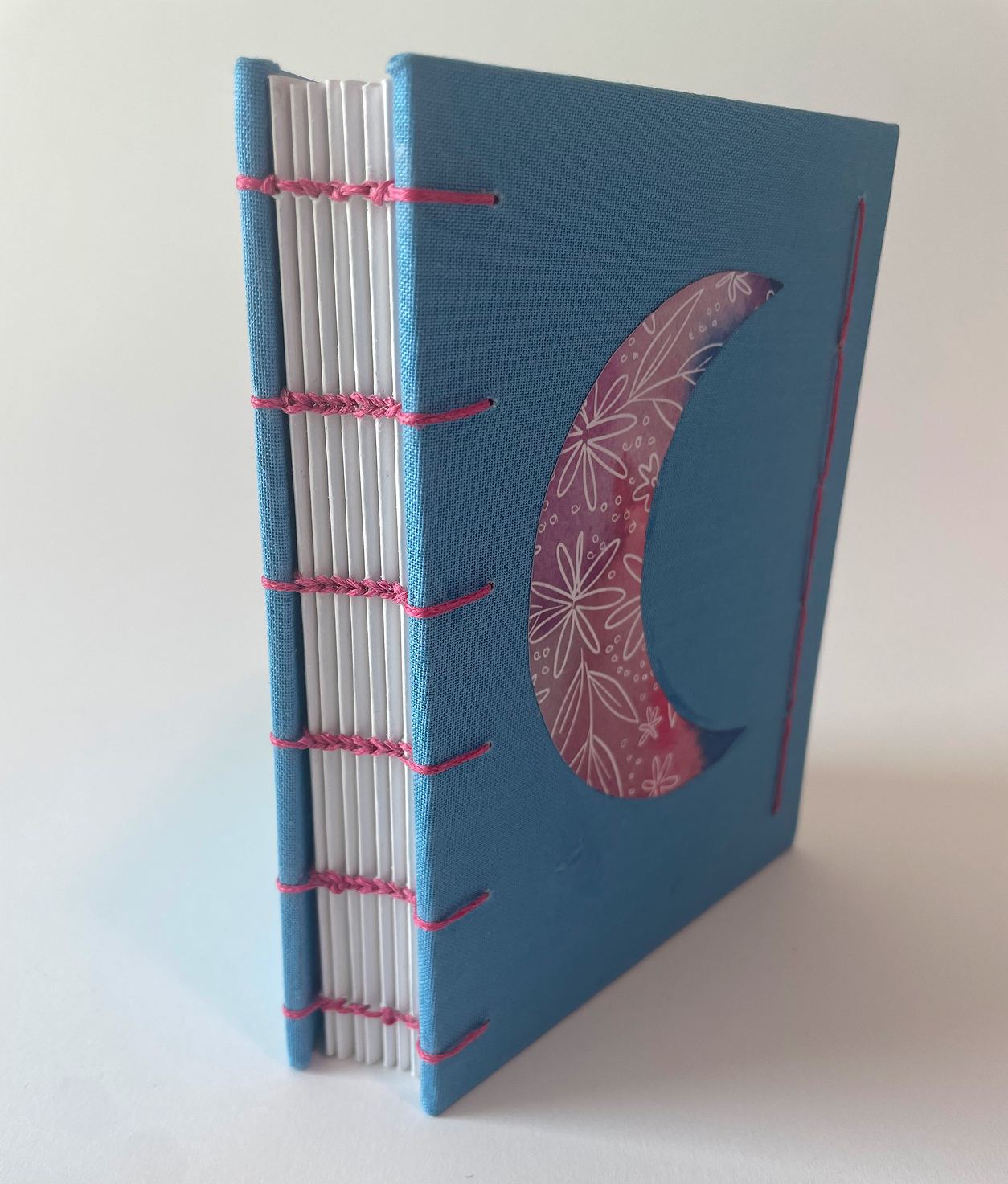 Image of blue book bound by Marissa