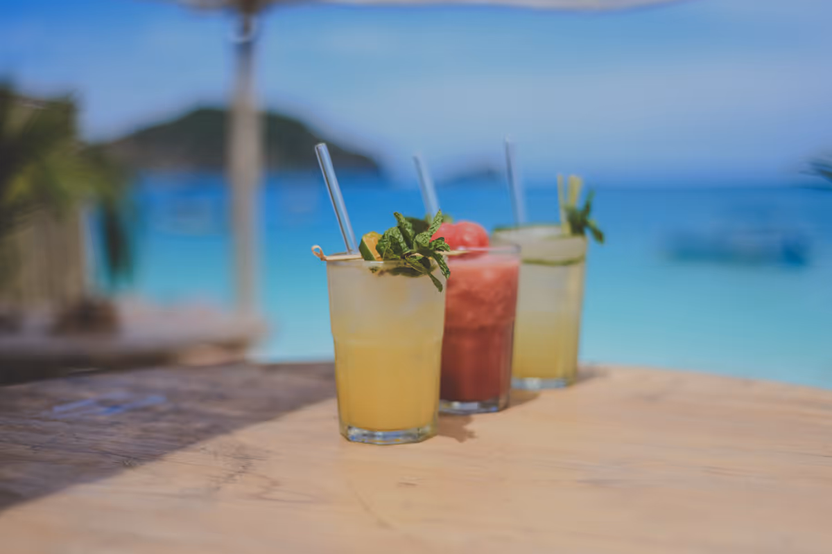 Tropical drinks on table with ocean view