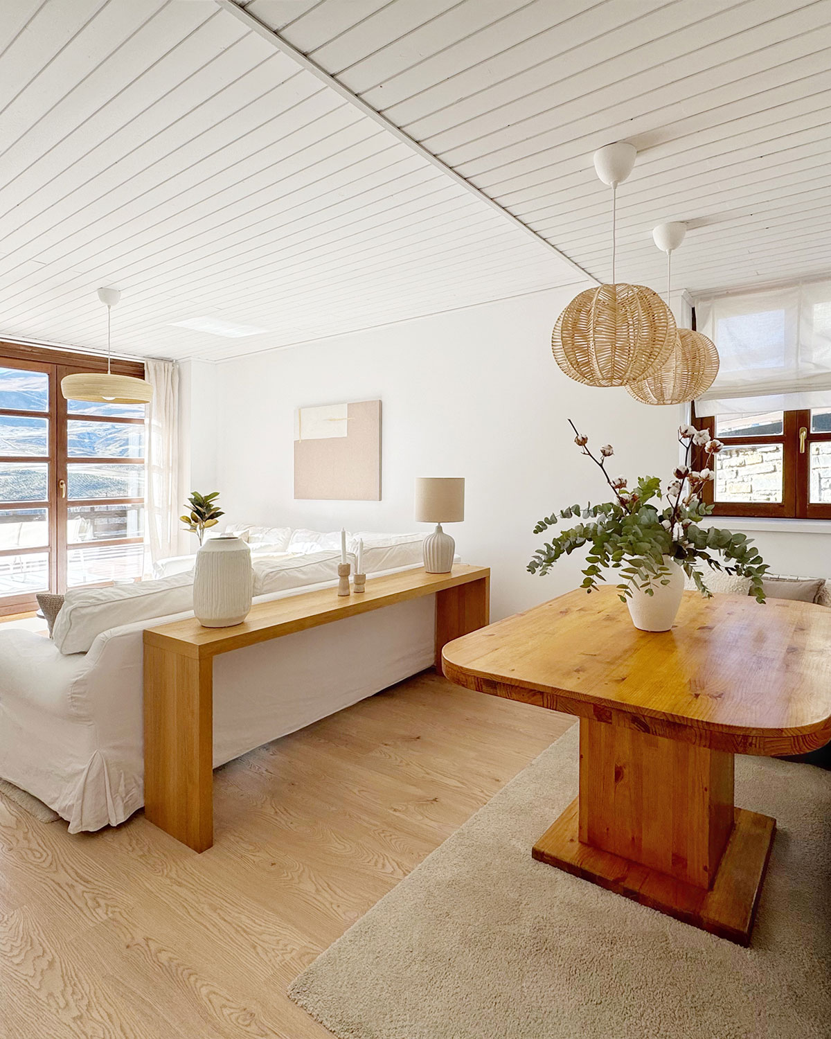 Living room with large angled window