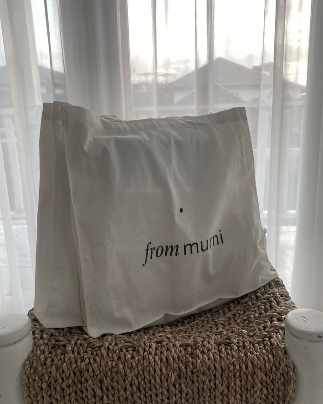 From Murni tote bag in a sunlit window
