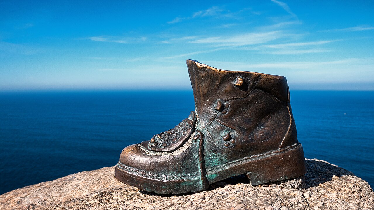 
Bronze sculpture of a pilgrim's boot at Cape of Finisterre (last station of the Way of St. James). Fisterra, La Coruña, Galicia, Spain