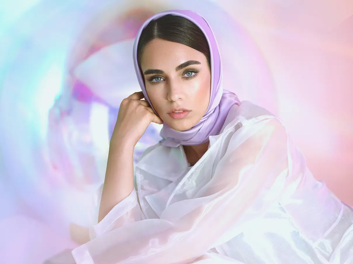 Female model posing, wearing Asteri makeup.