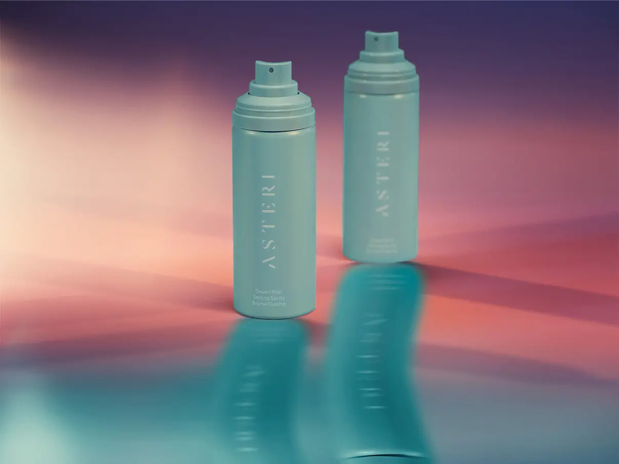 Product shot of two Asteri dessert mist bottles.