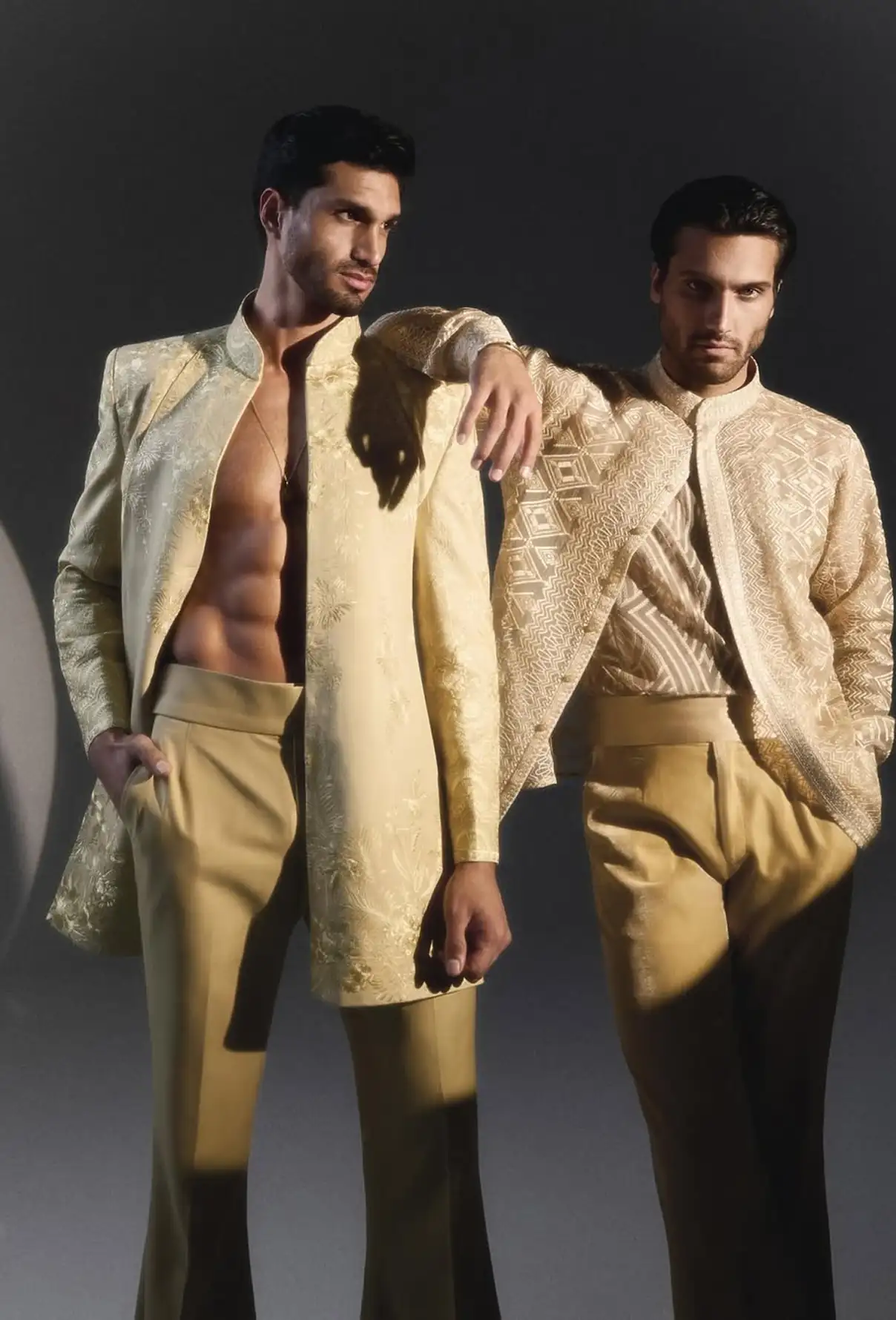 Two male models, wearing fashionable clothes from Faraz Manan.