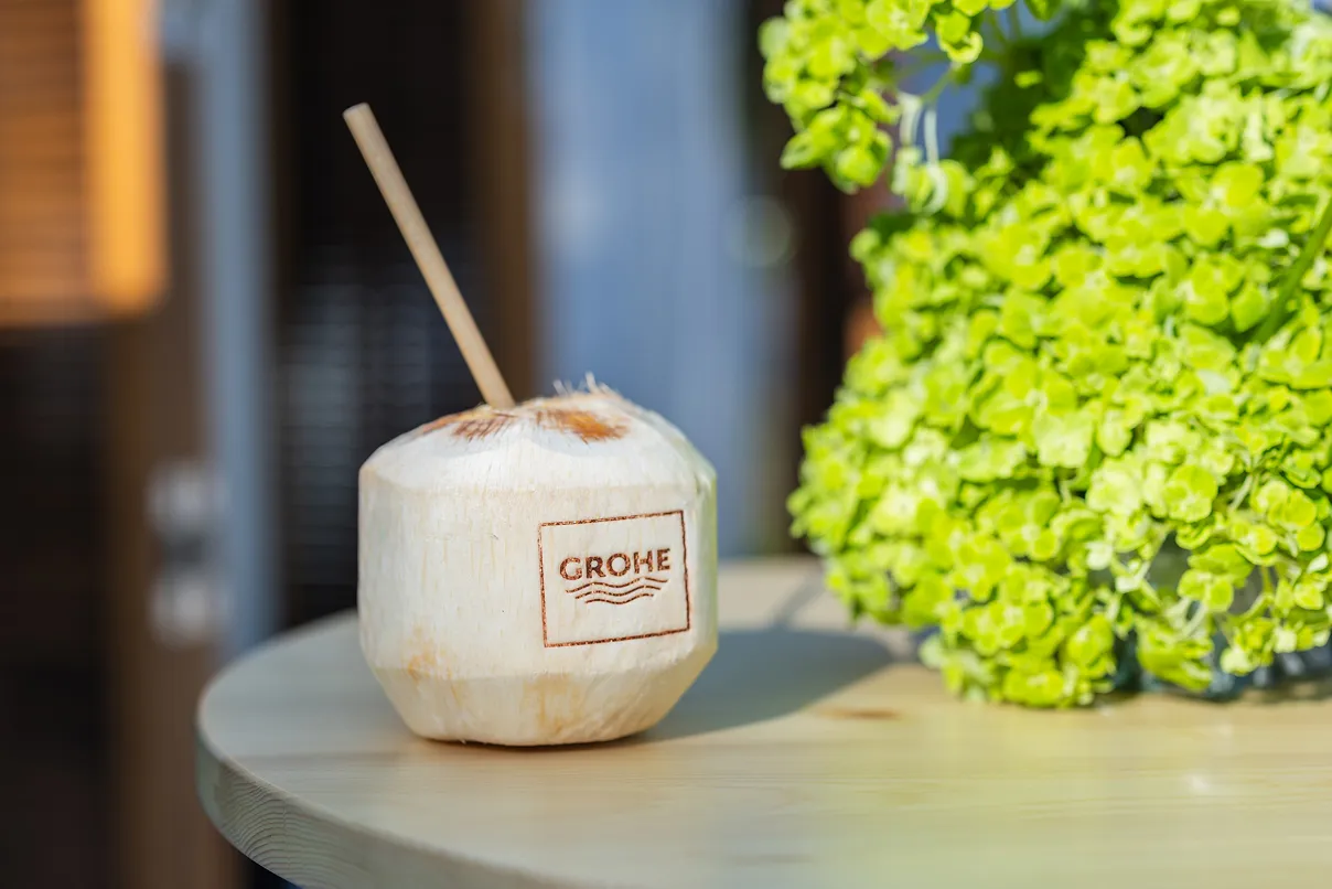 Coconut with the GROHE logo carved into it