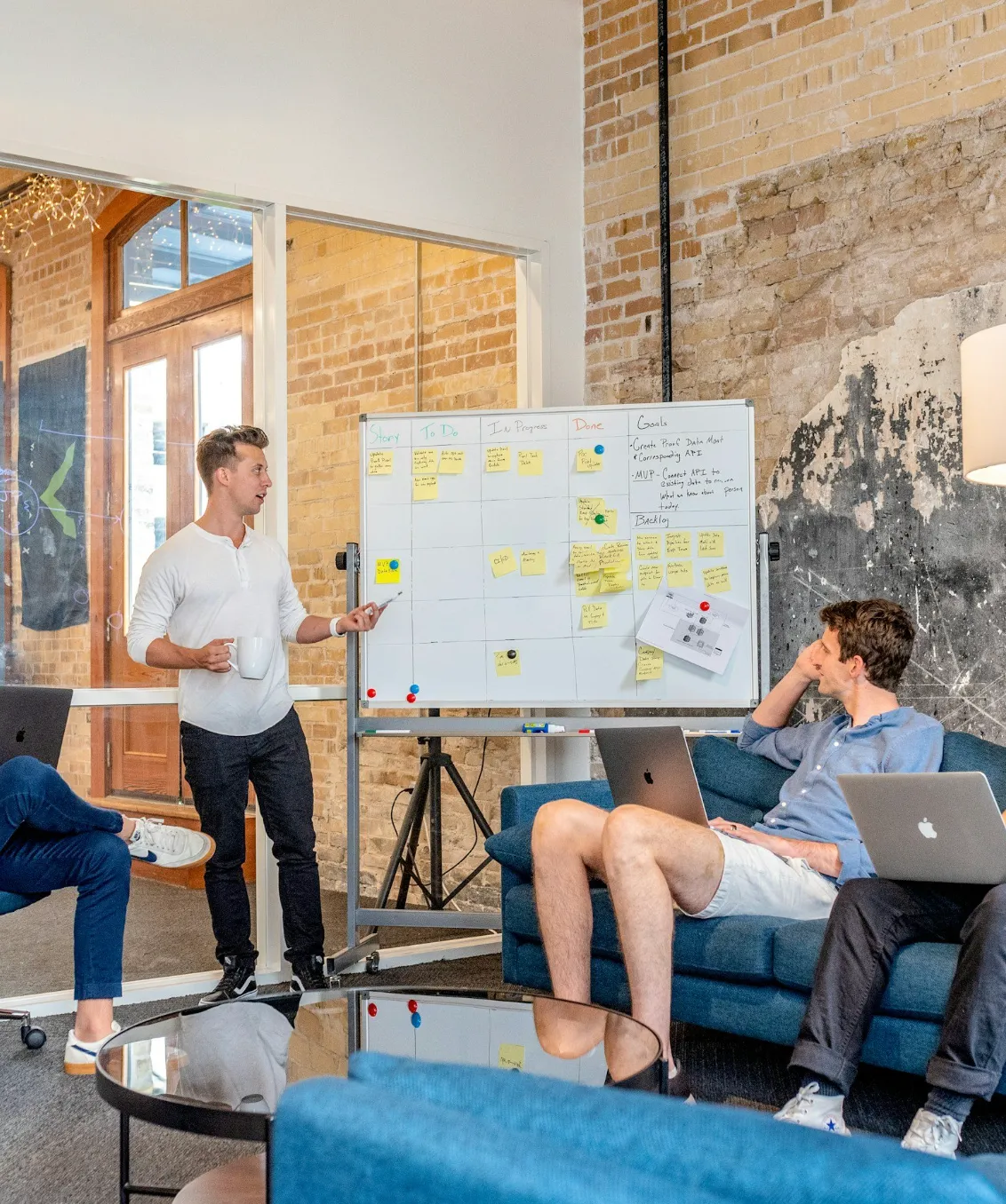 A coach leading his executive client through a team building exercise