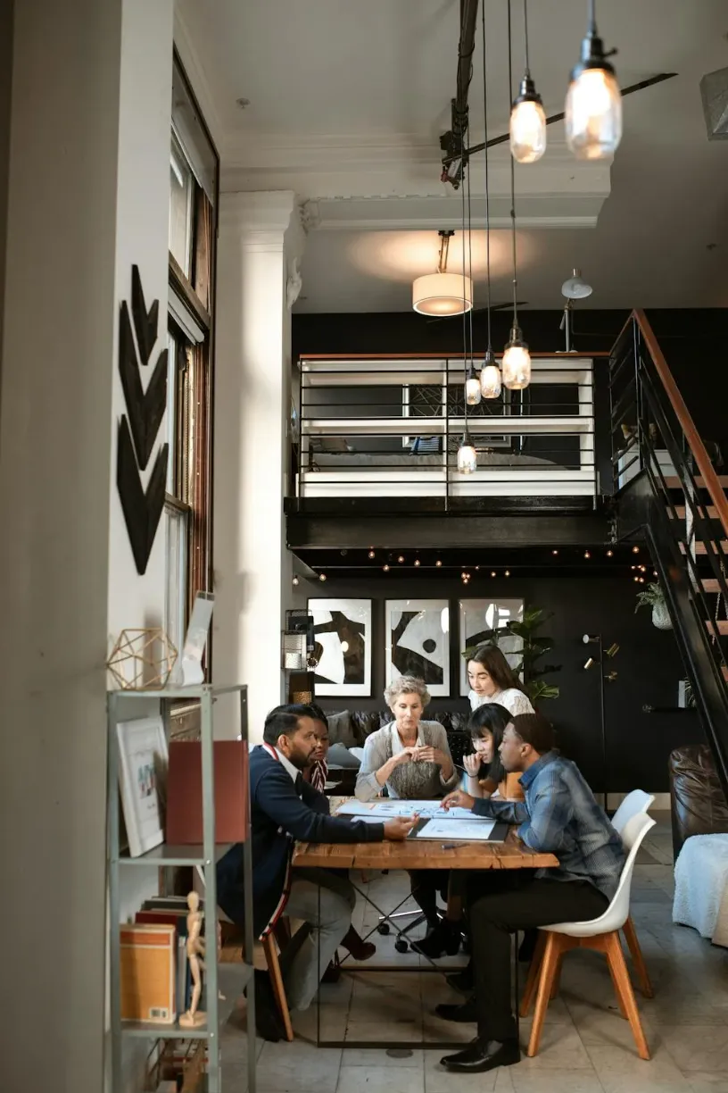 A team working together at a table in an office building