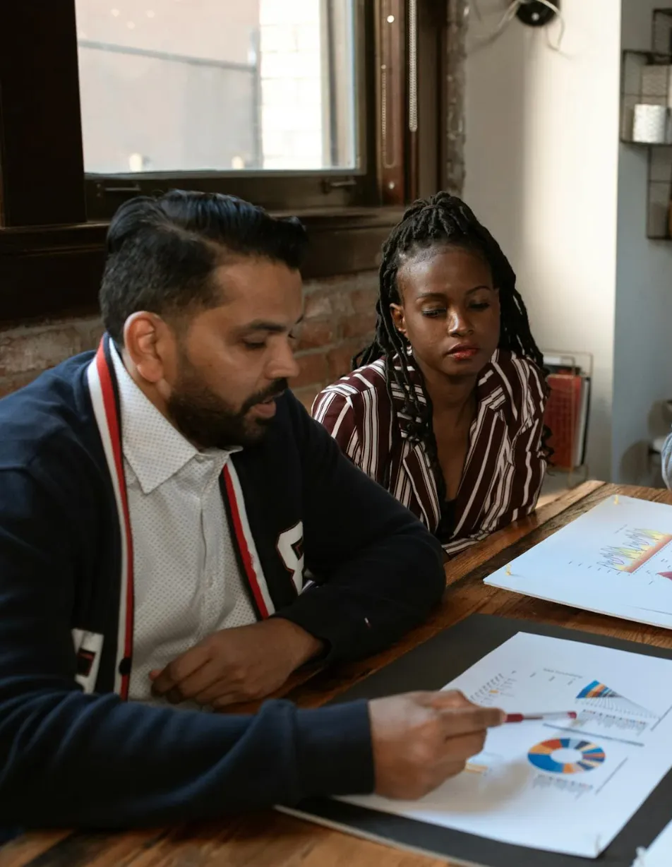 Coworkers working together at a table