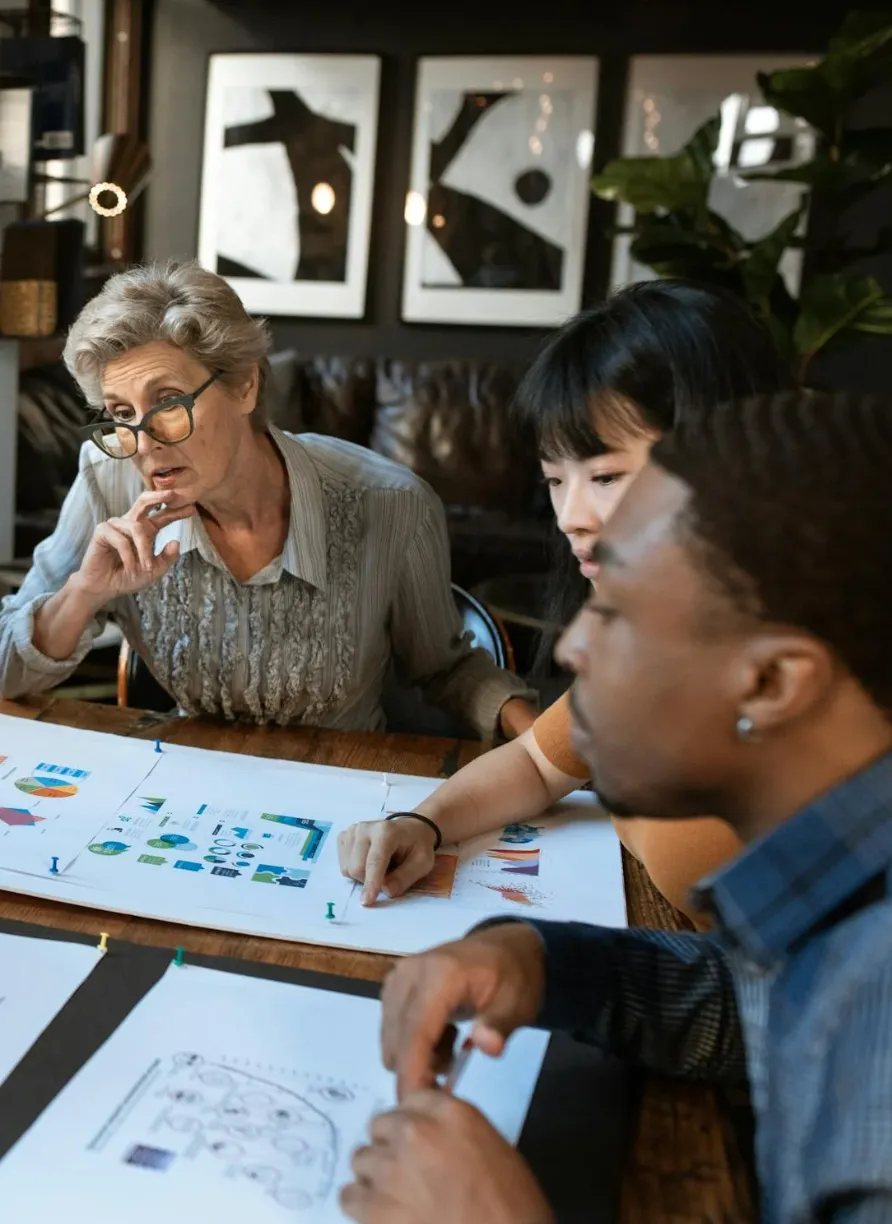 Executive talking to her team