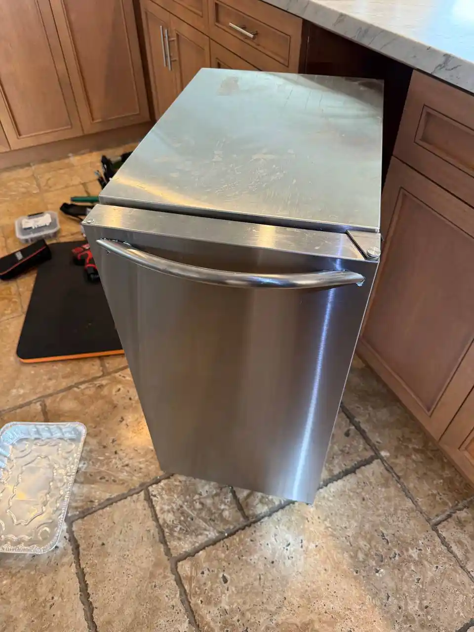 Built-in refrigerator ice maker unit in a Mira Mesa home,