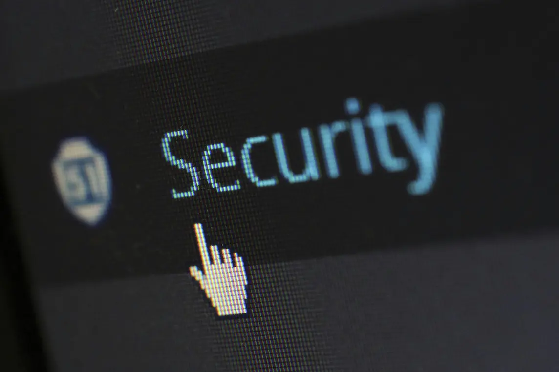 A computer mouse icon hovering above an icon labeled "Security".