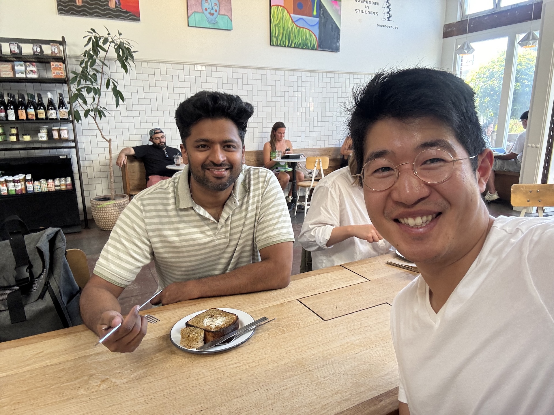 A photo of Ryo and Nik in a coffee shop in San Francisco