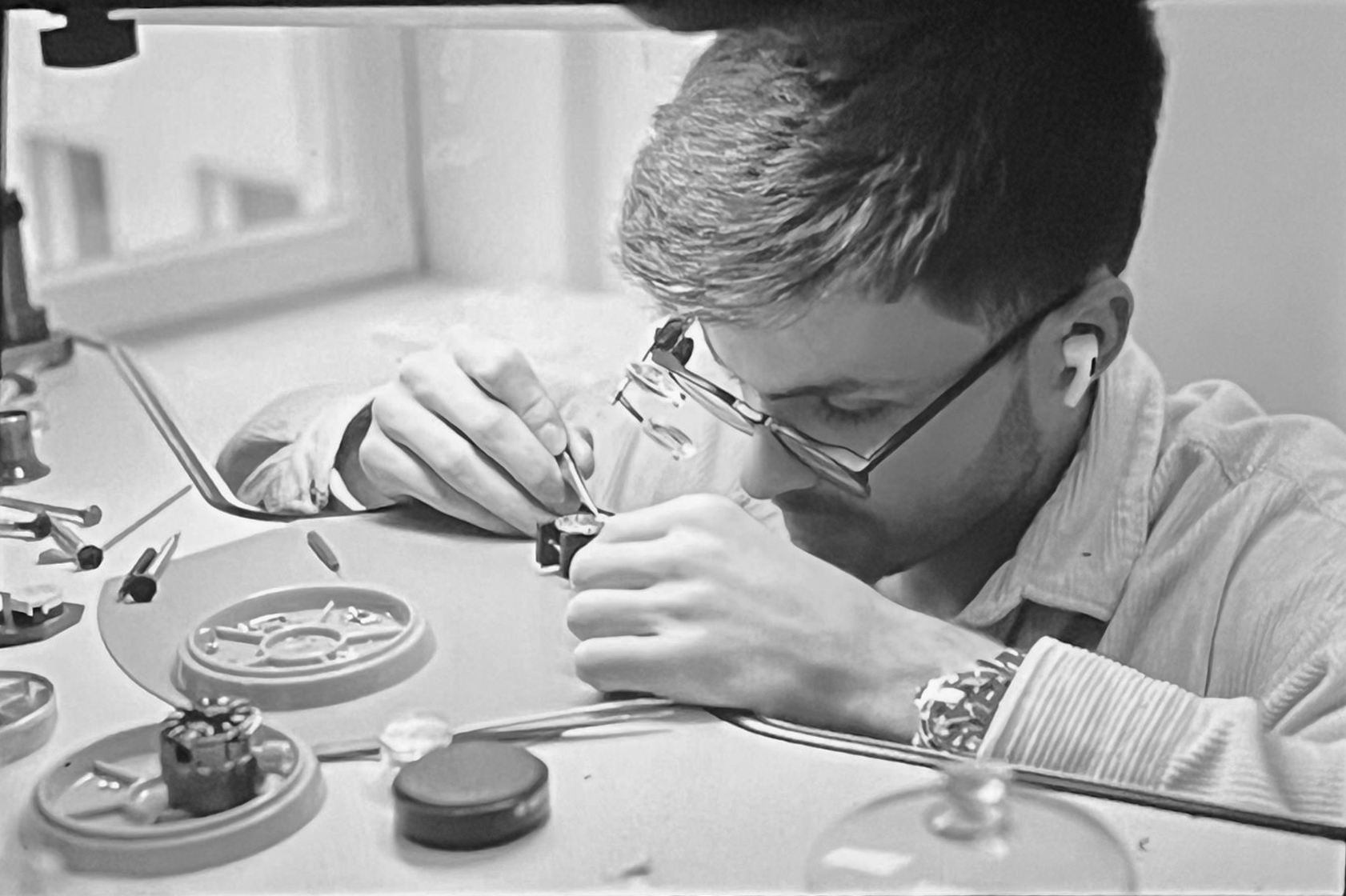 close-up of tattoo equipment on job posting board