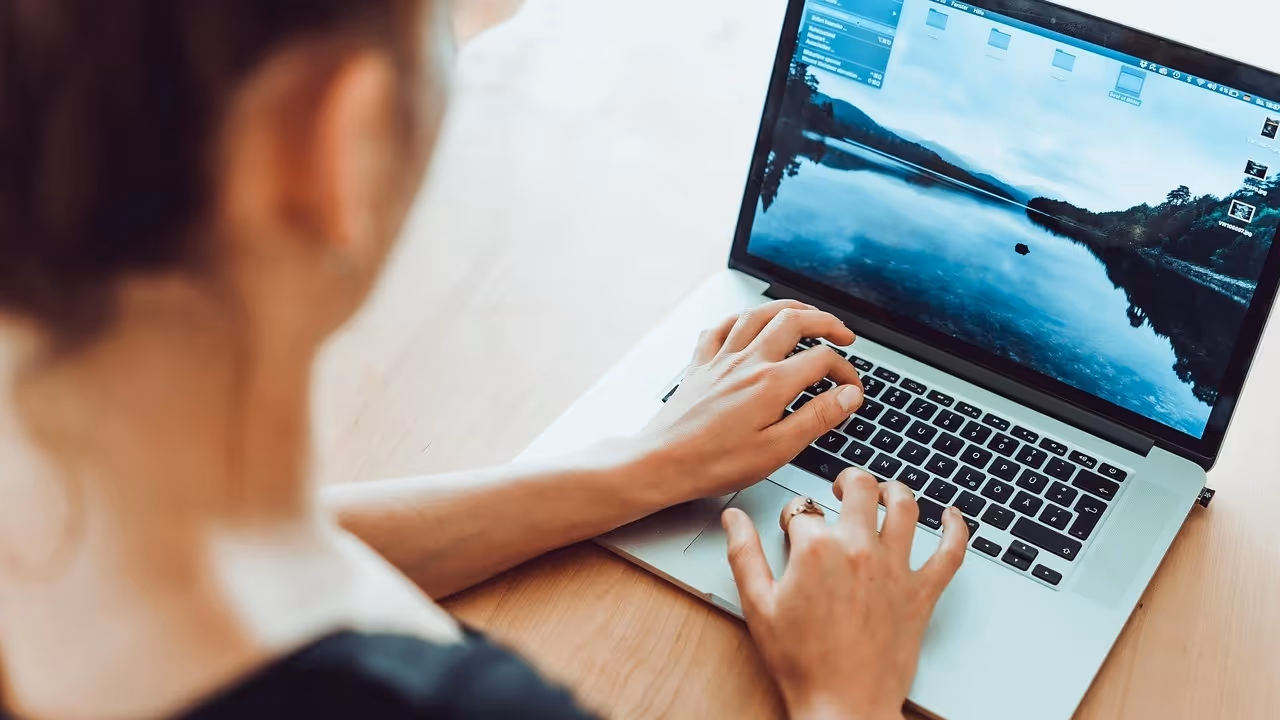 woman with laptop Beyond Border