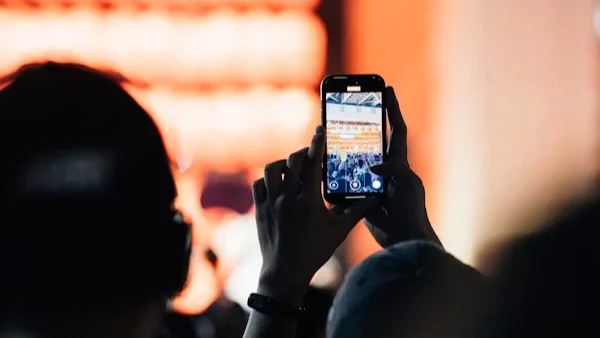 Person recording live event immigration firm Beyond Border