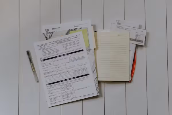 Immigration paperwork and notes I-485 Beyond Border