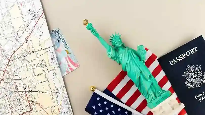 Statue of Liberty with passport and U.S. flag Beyond Border