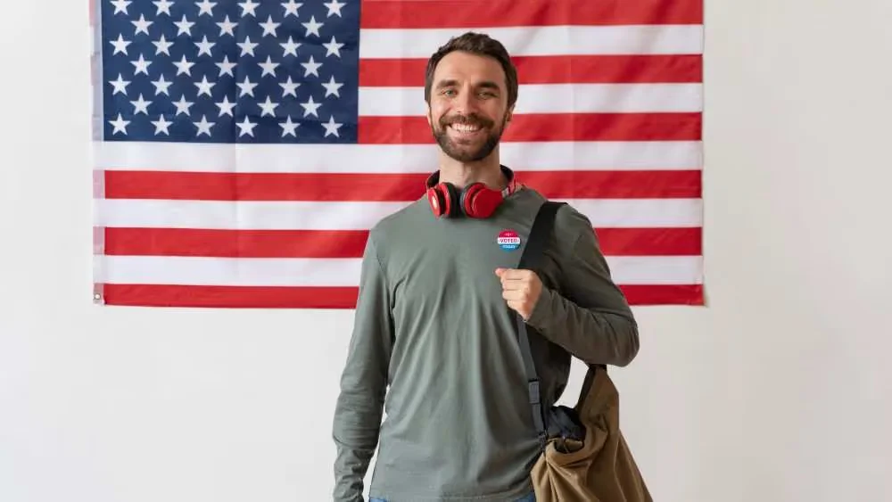 Man infront of USA flag Beyond Border