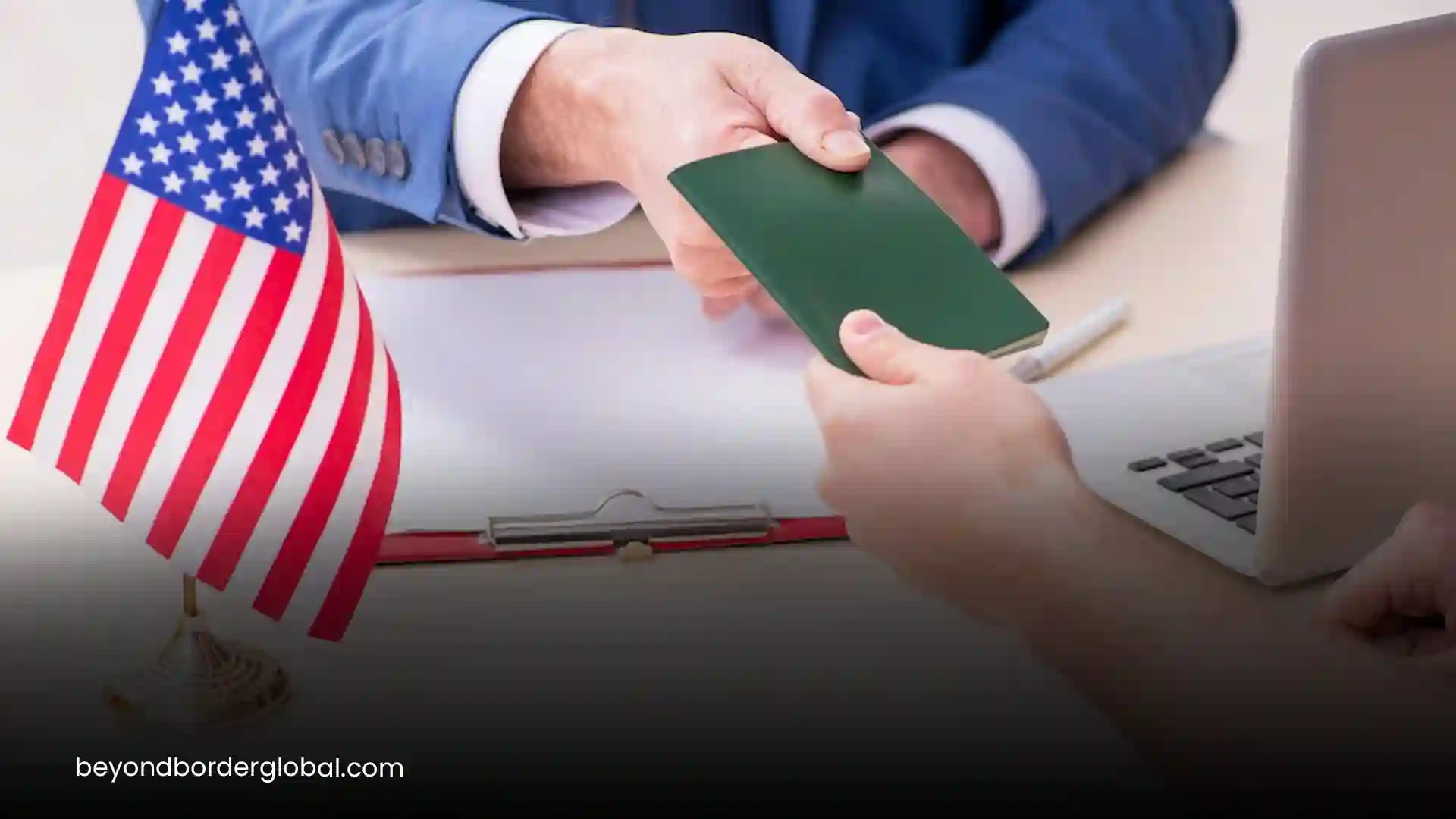 U.S. green card being handed over with American flag in the background Beyond Border