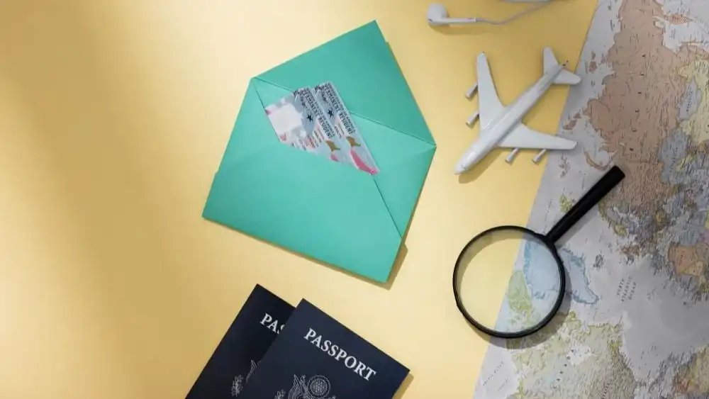 Passports, map, and travel documents on desk Beyond Border