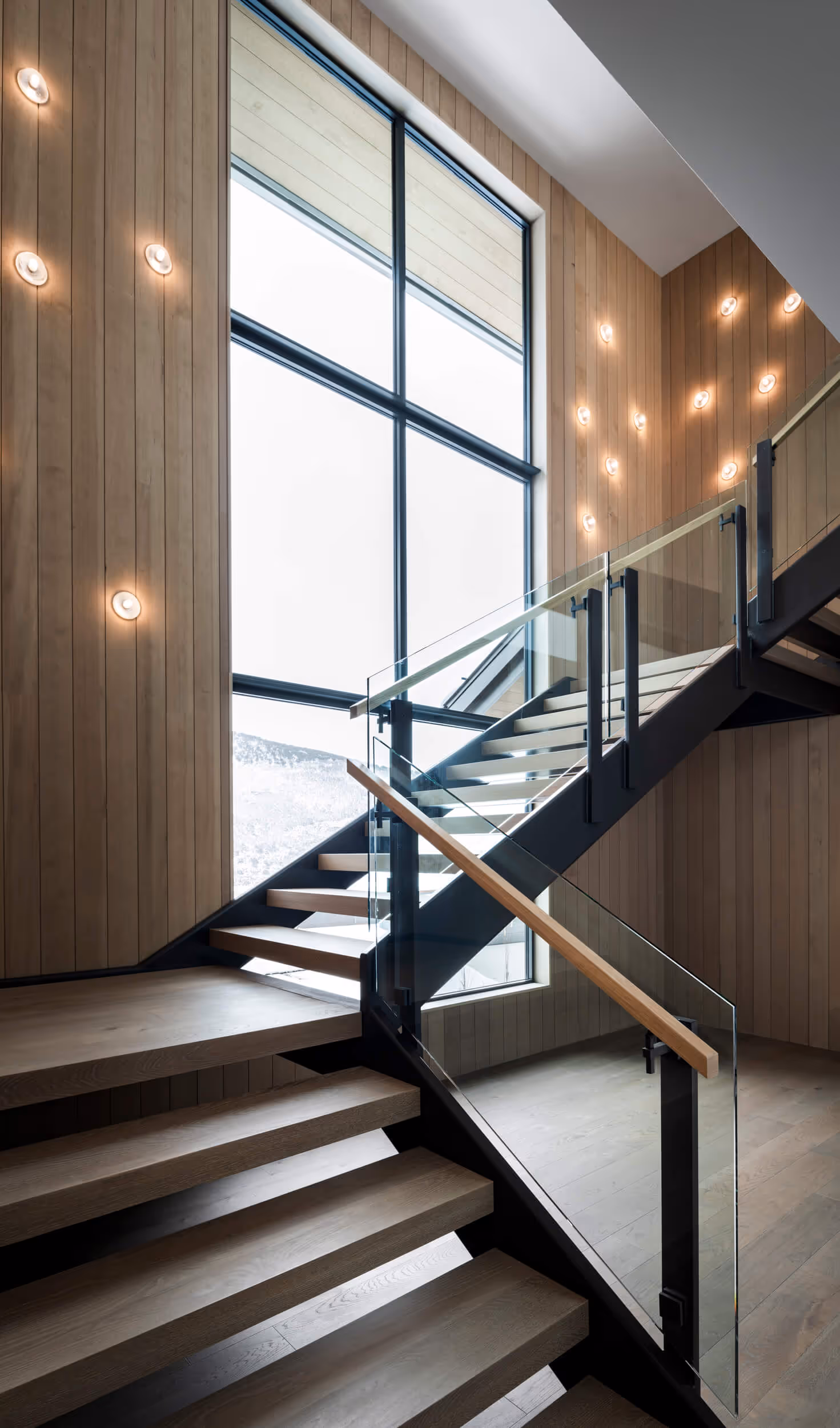 Staircase at Aspen Springs home, built by Elevated Builders 