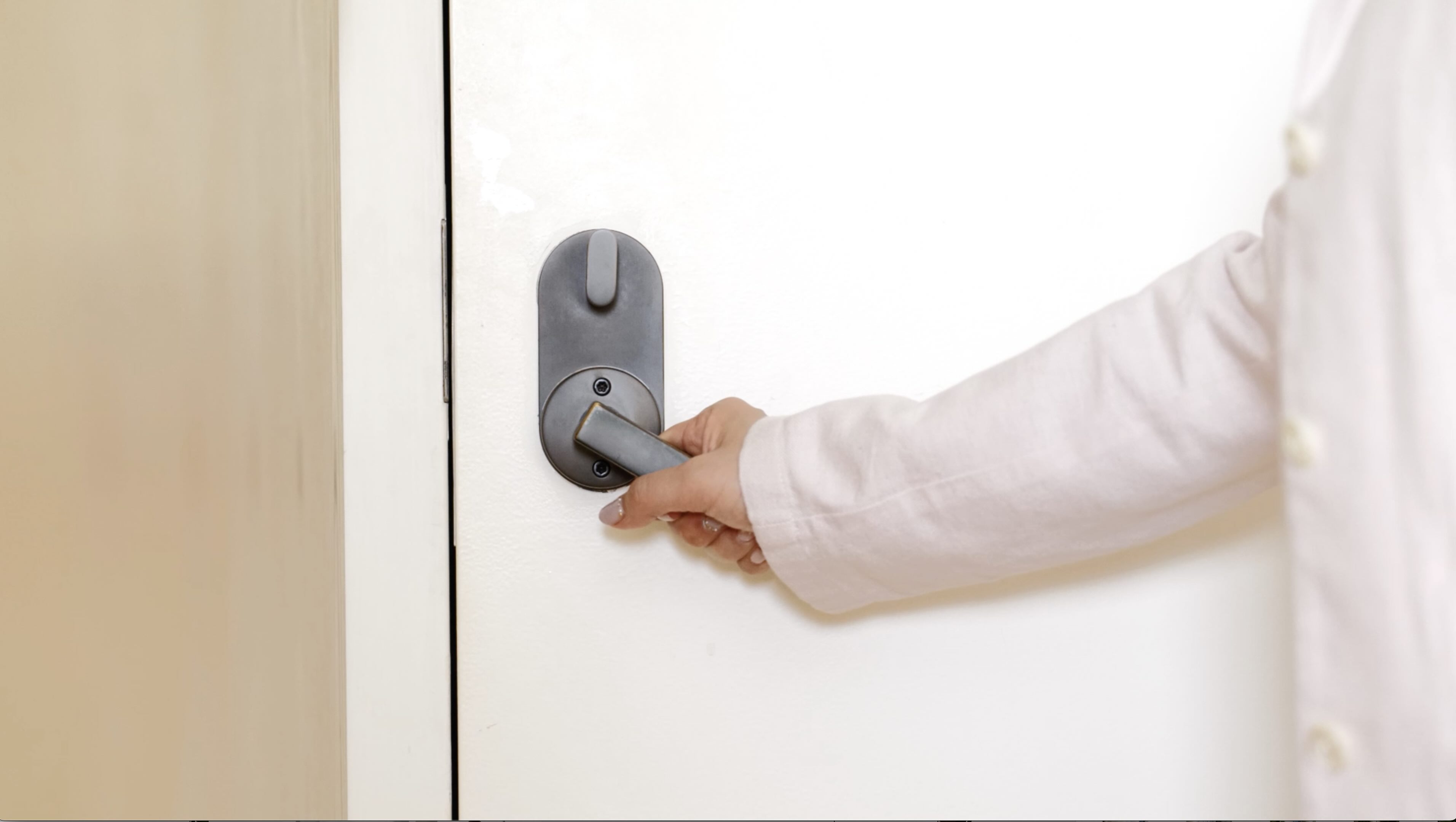 Two women in professional attire, illustrating the concept of following fashion trends for 2025.